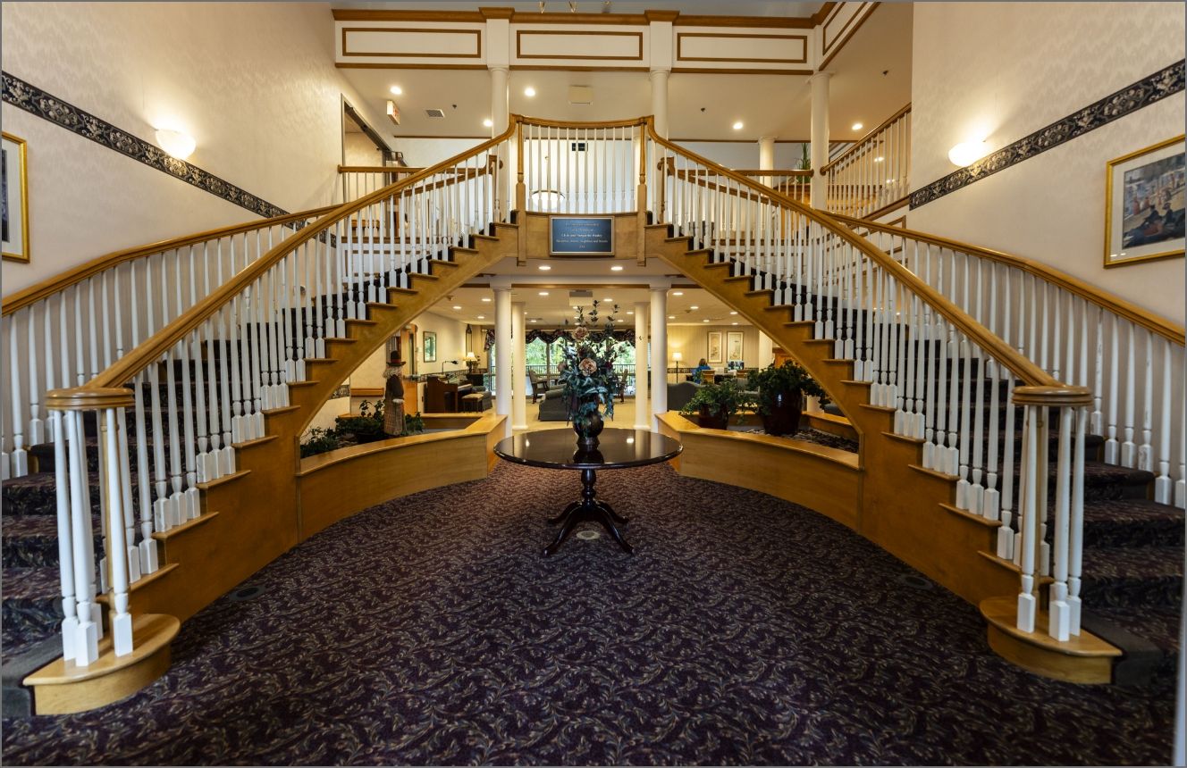 The grand atrium at Willow Brook Village in Delaware, Ohio, used in the contact page two-column section for this senior living community.