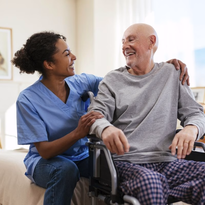 A warm moment between resident and caregiver at Willow Brook, where assisted living combines independence with compassionate hands-on support in Delaware, Ohio.